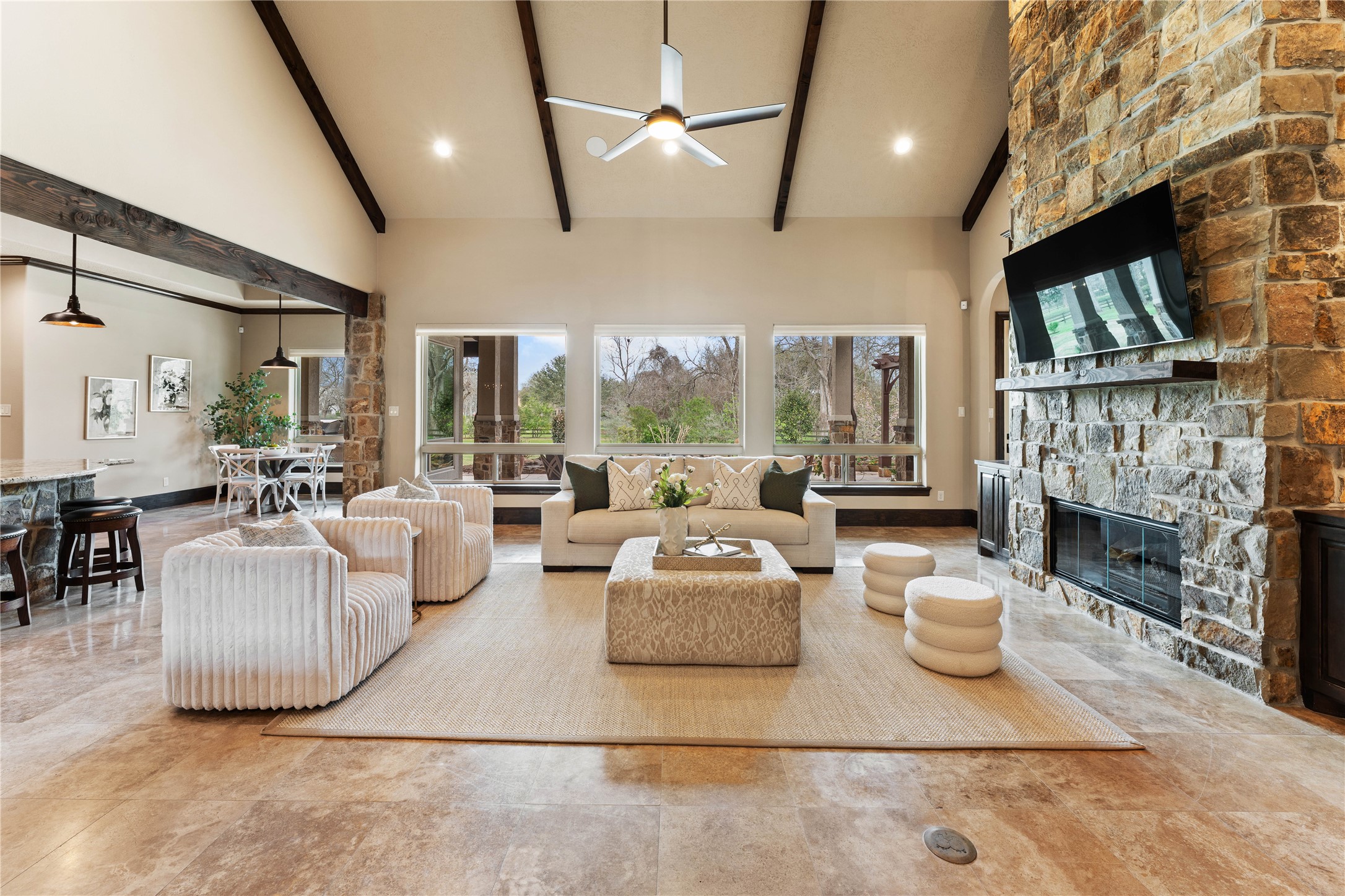 4727 Sugar Maple Court Fulshear, TX 77441 - Photo 5 of 50 a living room with fireplace furniture and a fireplace