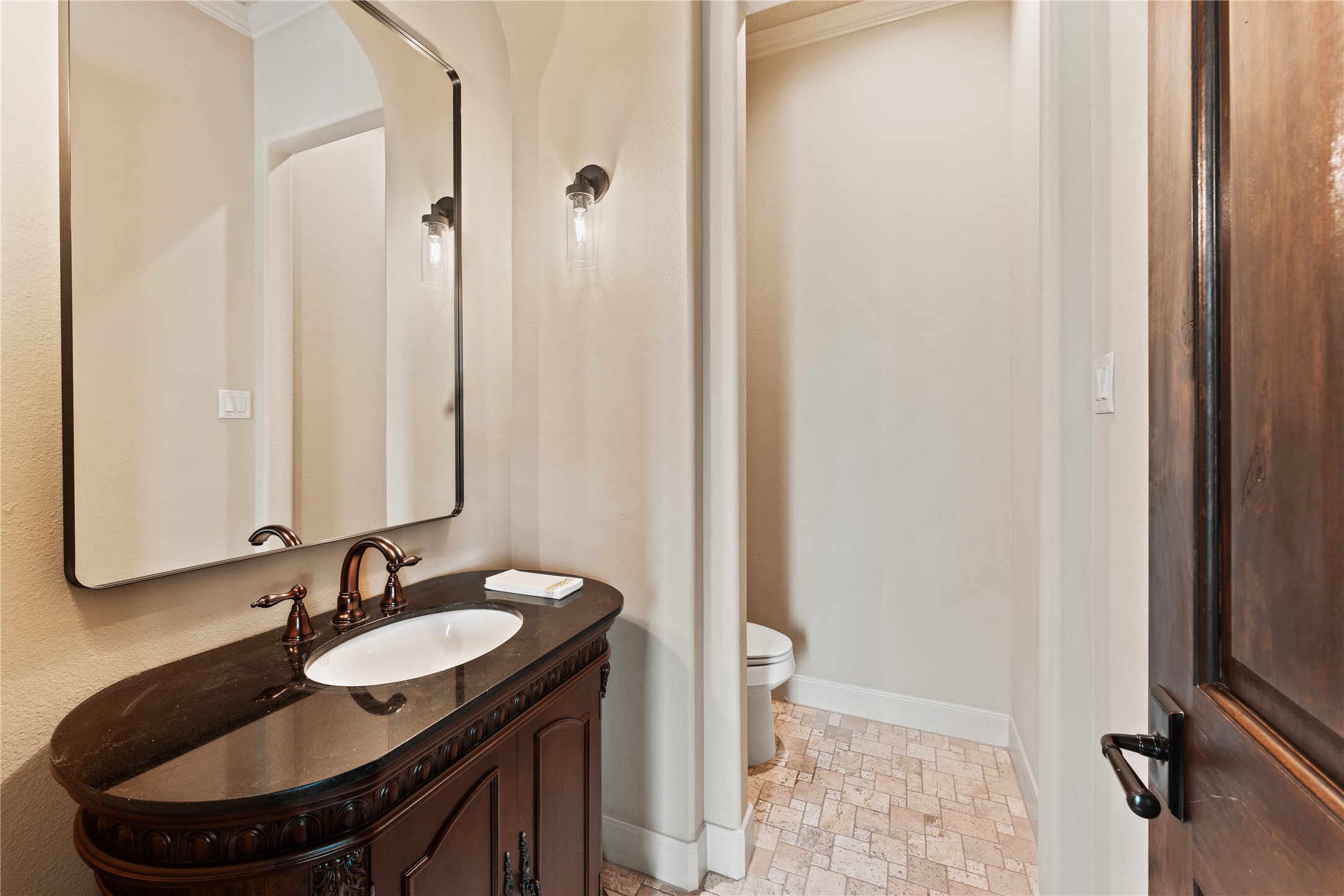 4727 Sugar Maple Court Fulshear, TX 77441 - Photo 8 of 50 a bathroom with a sink and a mirror
