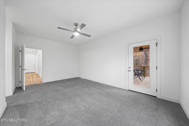 an empty room with a hallway