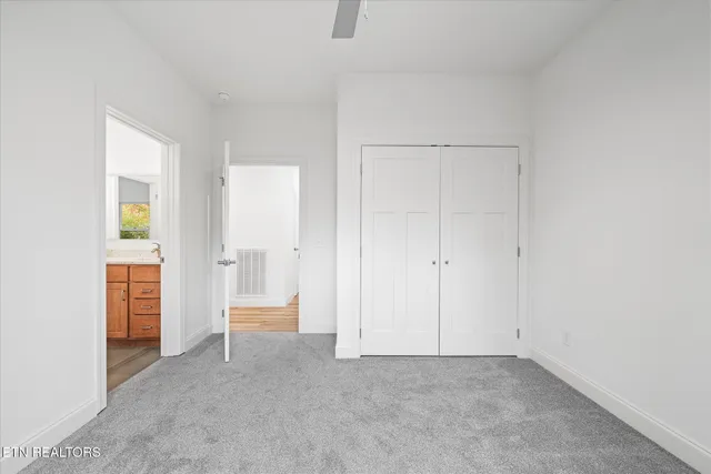 a view of an empty walk in closet