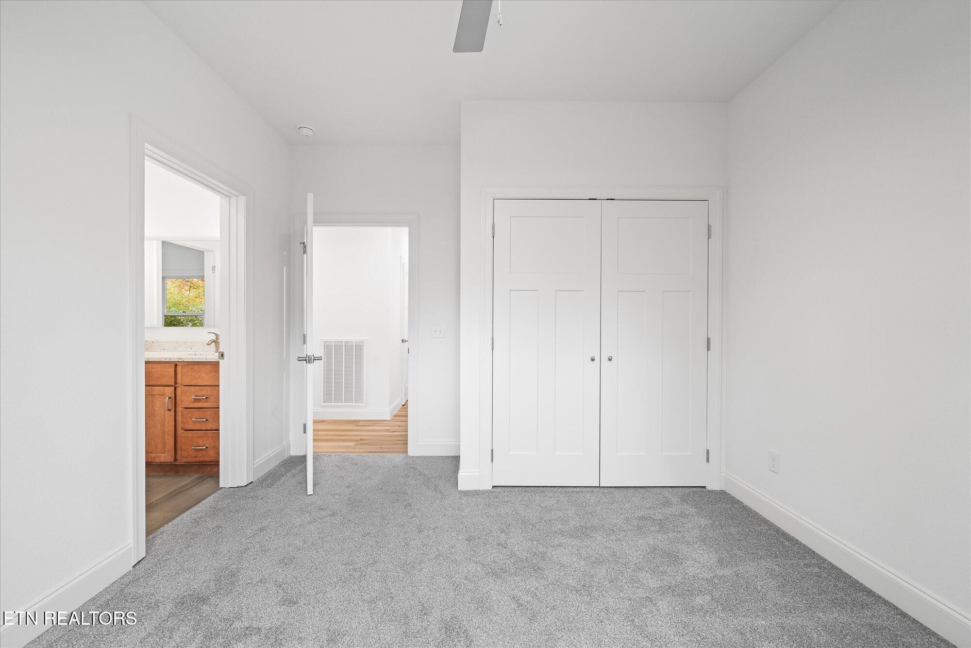 565 Grassland Road Crossville, TN 38572 - Photo 27 of 53 an empty room with a bathroom