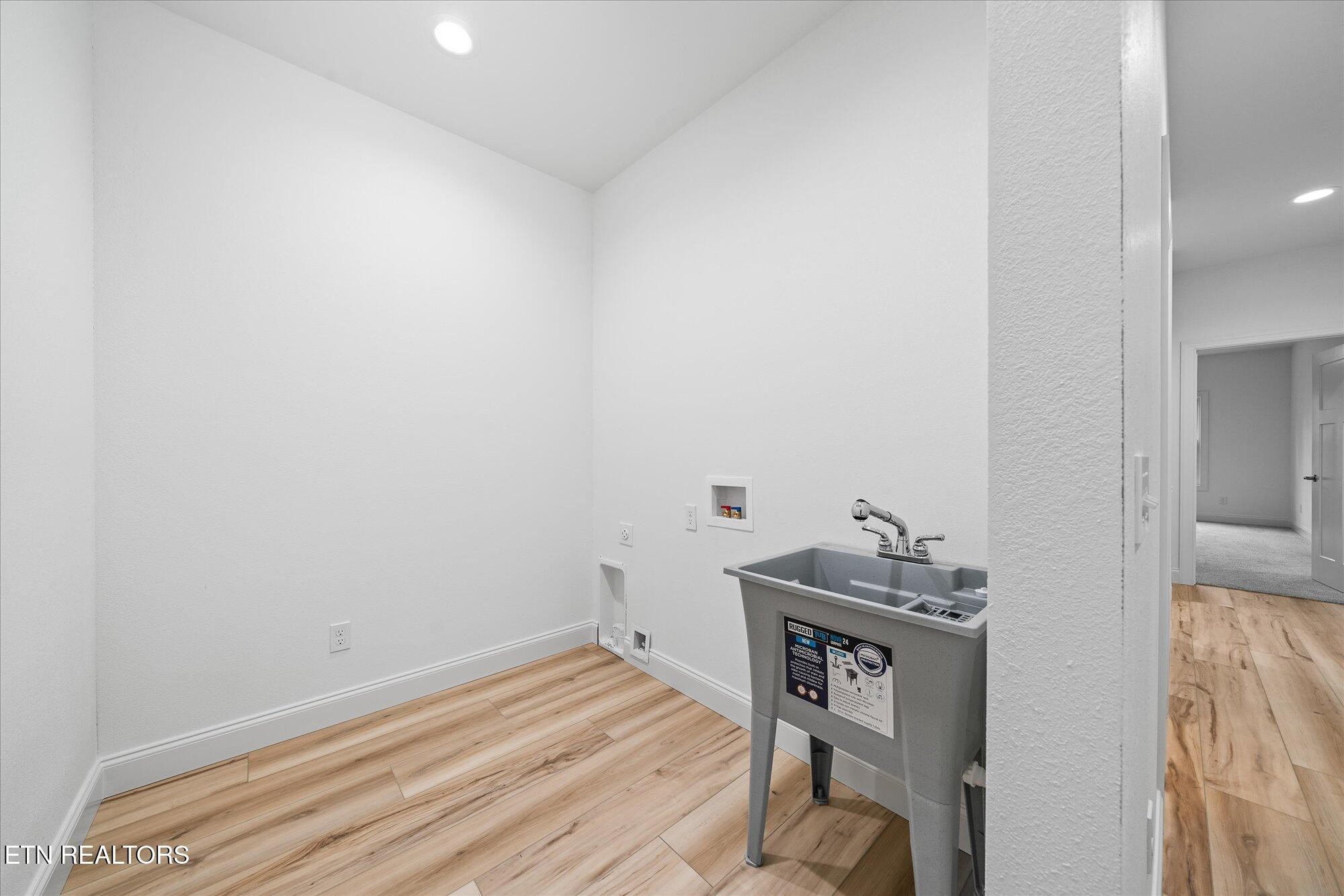 565 Grassland Road Crossville, TN 38572 - Photo 33 of 53 a room with storage and utility