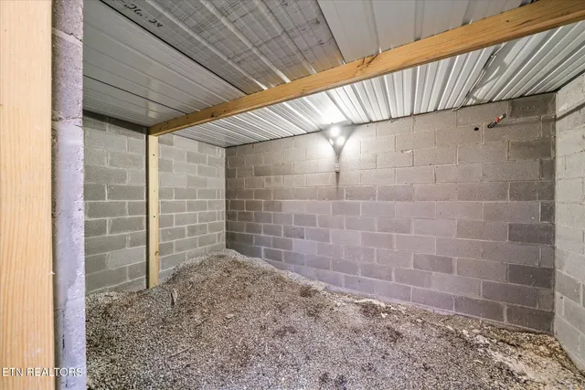 a wooden house with large trees
