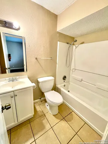 a hallway with wooden floor