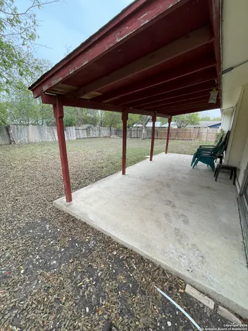 a swimming pool with outdoor seating