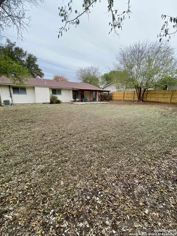 a view of room with refrigerator