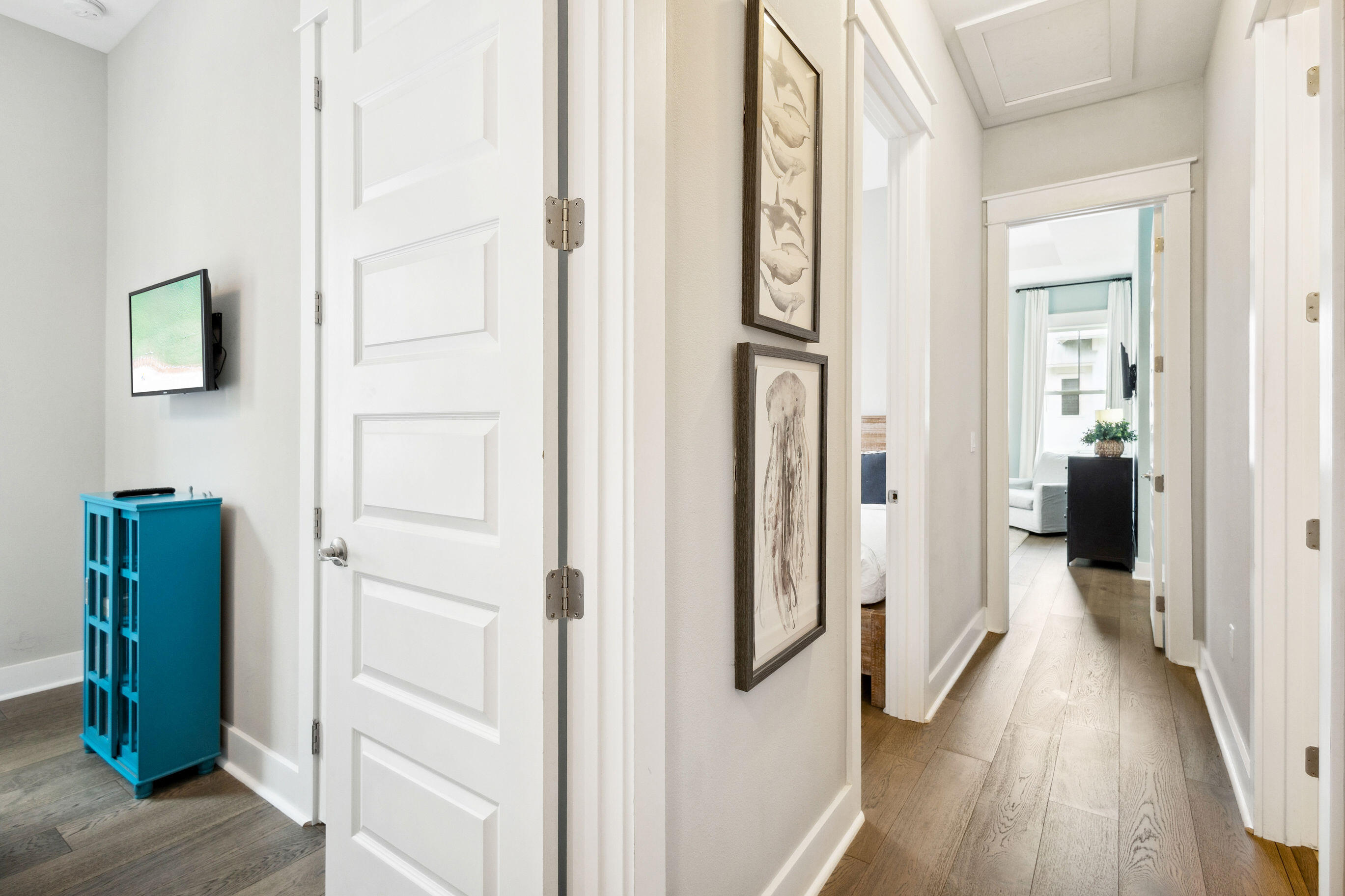 12 Milestone Dr Inlet Beach, Unit A Inlet Beach, FL 32461 - Photo 17 of 38 a view of a hallway with wooden floor and closet