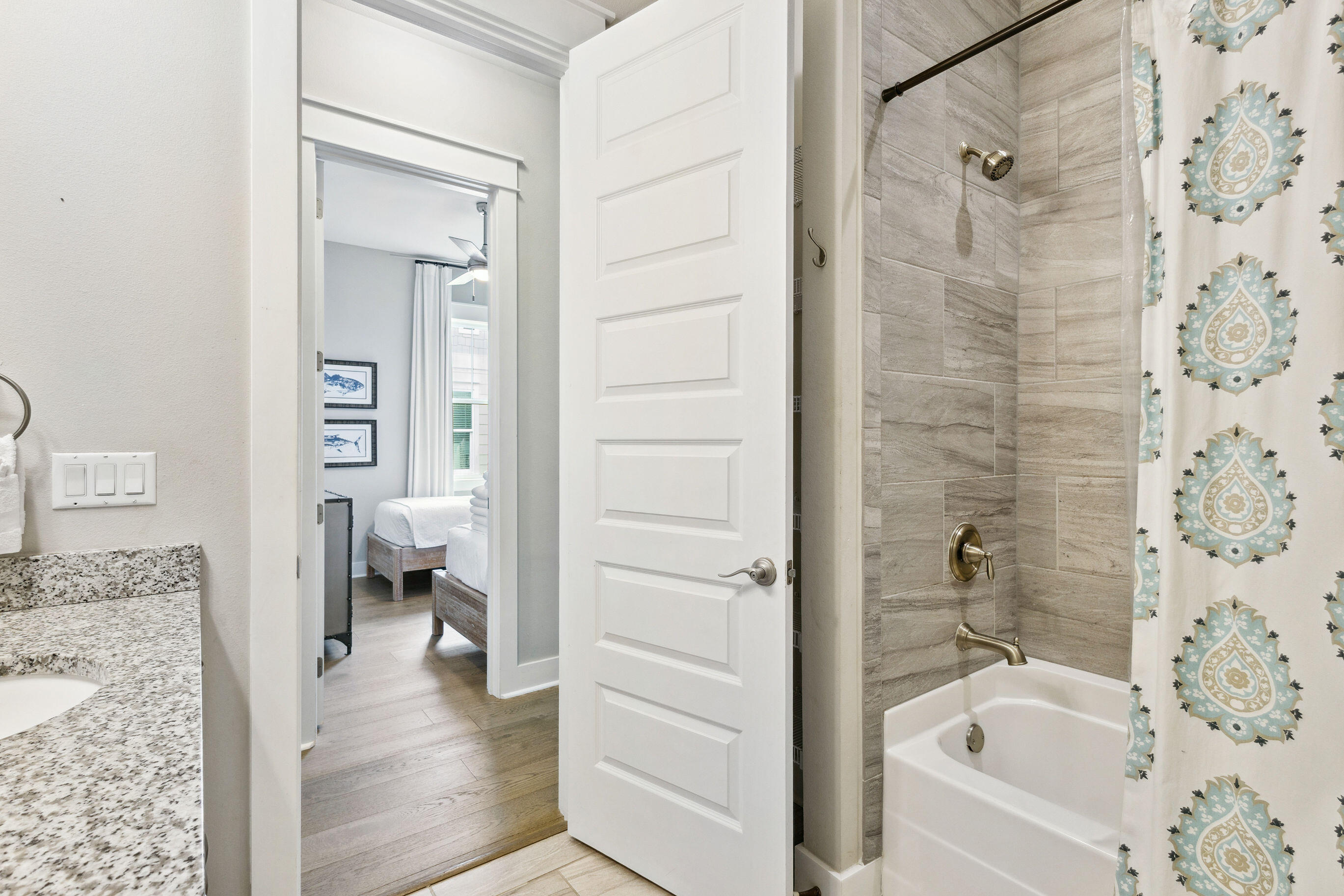 12 Milestone Dr Inlet Beach, Unit A Inlet Beach, FL 32461 - Photo 21 of 38 a bathroom with a bathtub and a shower