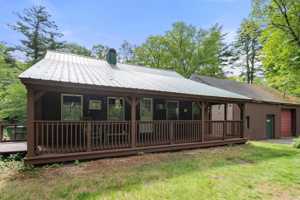 24 Webber Road Brookfield, MA 01506 - Photo 4 of 27 a view of a house with a yard and deck