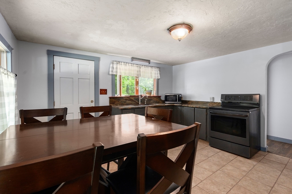 24 Webber Road Brookfield, MA 01506 - Photo 6 of 27 a kitchen with a sink cabinets and stainless steel appliances