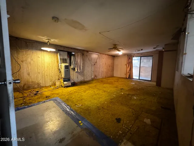 a utility room with cabinets washer and dryer