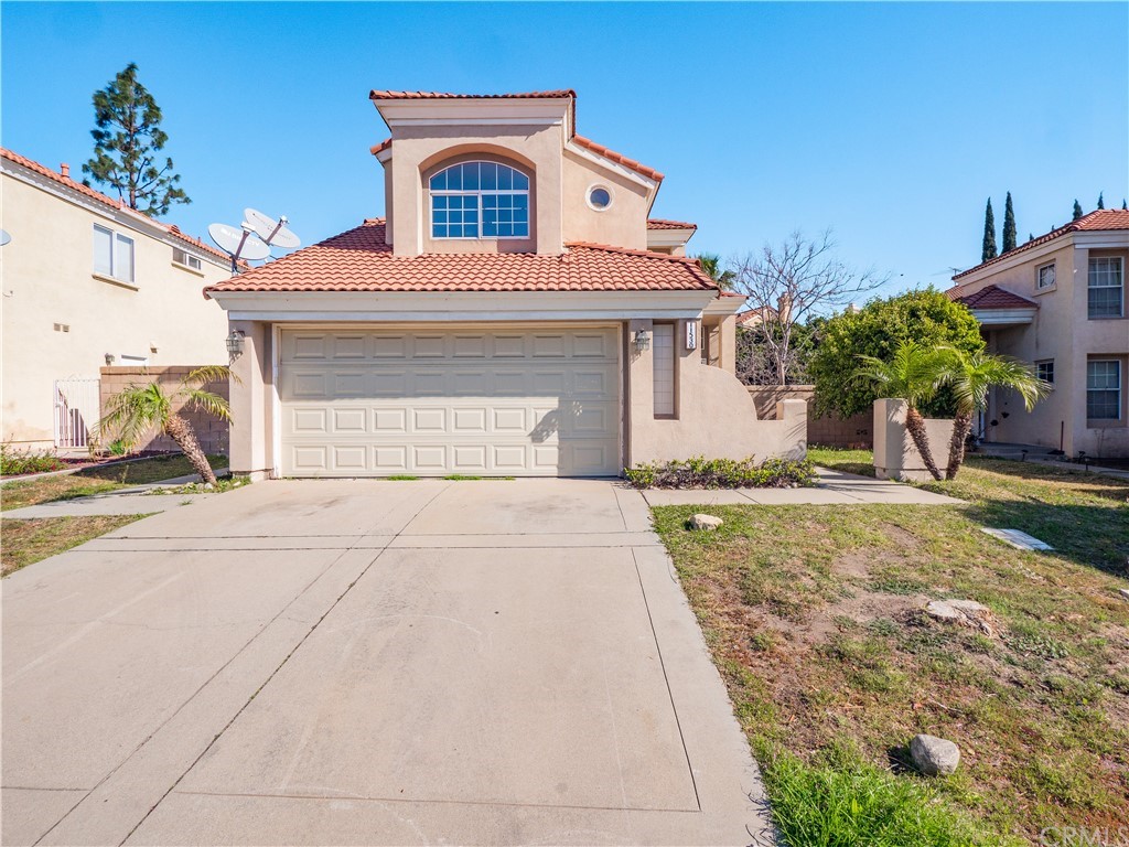 11530 Lancaster Way Rancho Cucamonga, CA 91730 - Photo 1 of 1 a front view of a house with a yard and garage