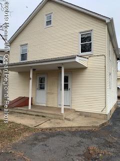 3 Thompson Street Raritan, NJ 08869 - Photo 3 of 6 a view of a house with a backyard