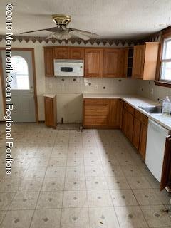 3 Thompson Street Raritan, NJ 08869 - Photo 6 of 6 a kitchen with a sink and cabinets