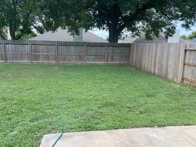 6519 Greenhouse Road Katy, TX 77449 - Photo 14 of 15 a view of backyard with wooden fence