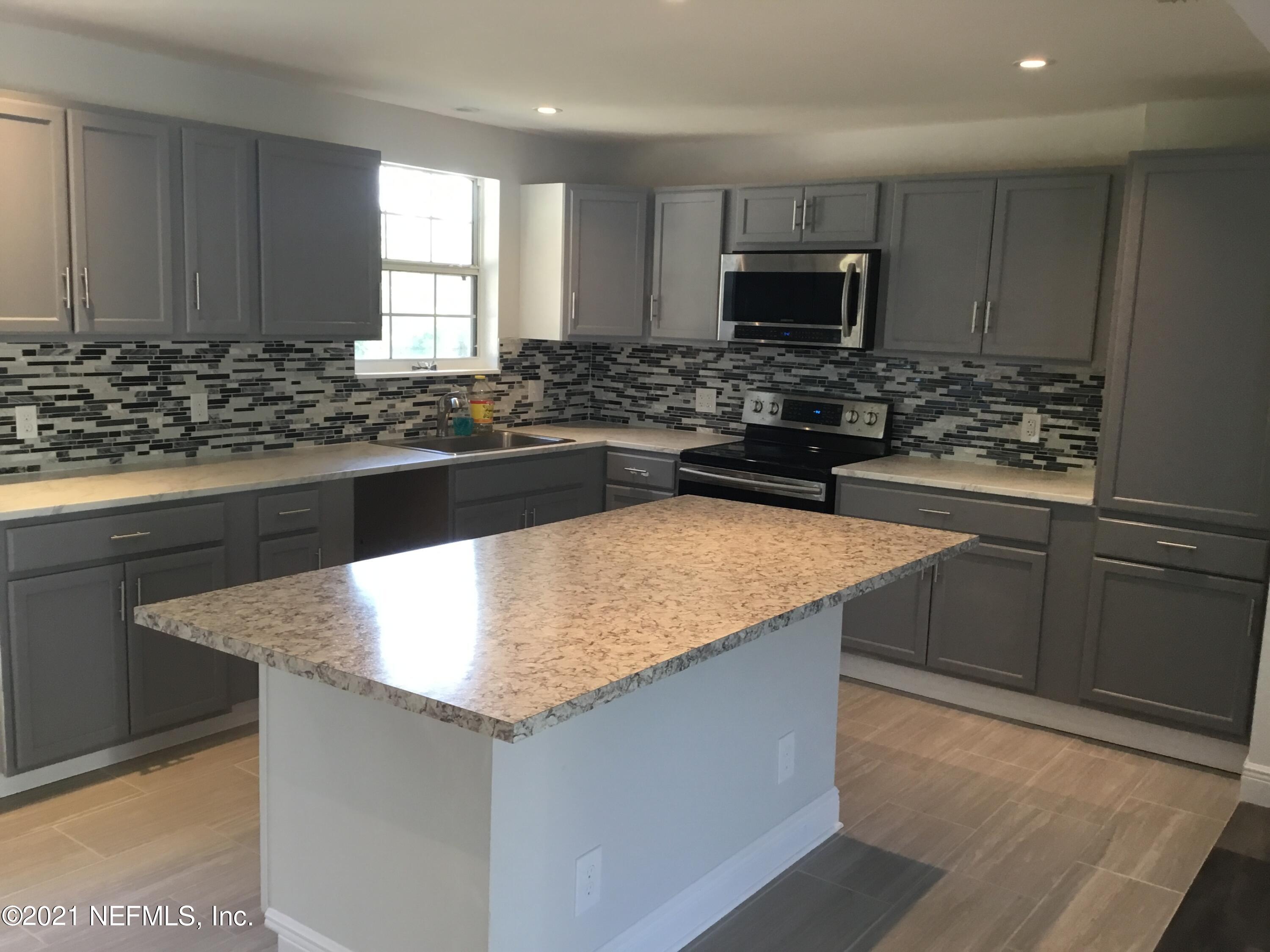 6213 Anvil Road Jacksonville, FL 32277 - Photo 7 of 28 9703D94E-47EF-4212-9554-A7E3B1AD4A23