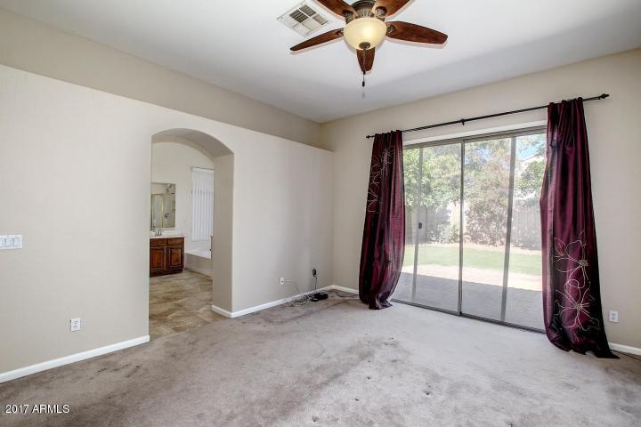 16810 North 62nd Place Scottsdale, AZ 85254 - Photo 16 of 31 an empty room with windows and closet