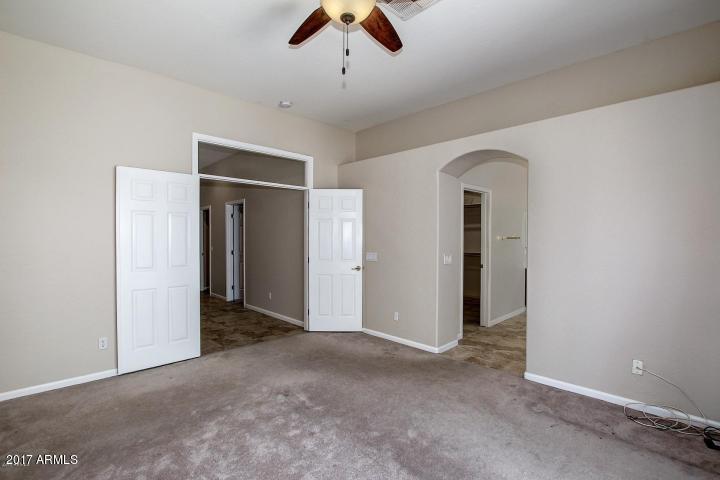 16810 North 62nd Place Scottsdale, AZ 85254 - Photo 17 of 31 an empty room with ceiling fan and window