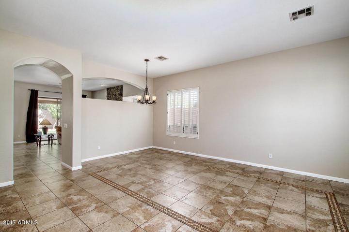 16810 North 62nd Place Scottsdale, AZ 85254 - Photo 3 of 31 a view of livingroom with hardwood floor and a ceiling fan