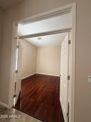 a kitchen with granite countertop cabinets stainless steel appliances and a sink