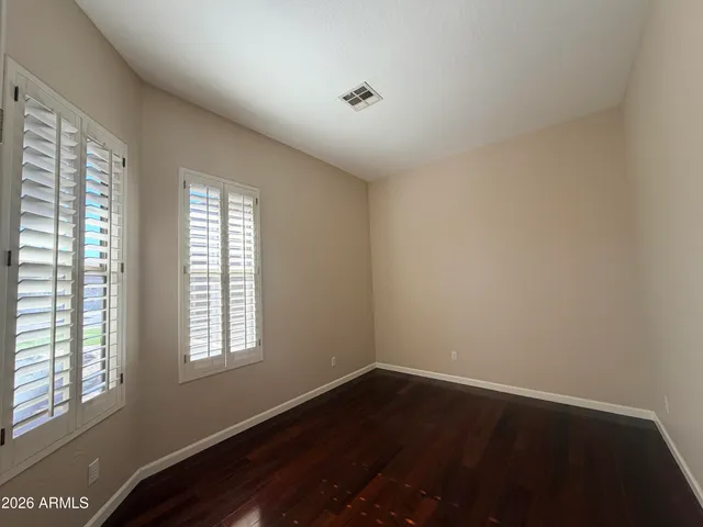 a kitchen with granite countertop a stove and a sink