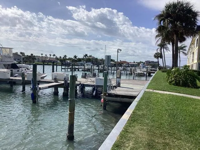 a view of a lake with outdoor seating
