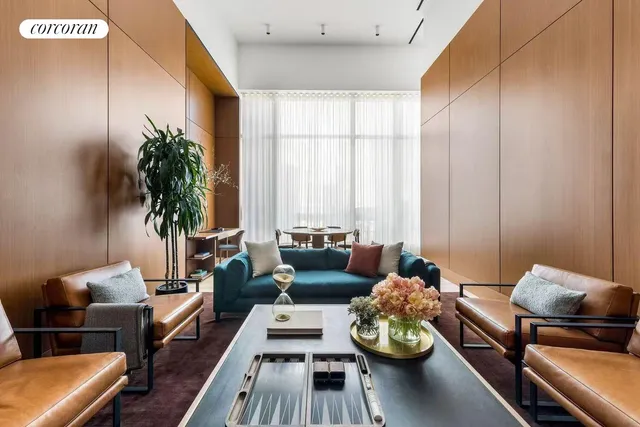 a kitchen with a table and chairs