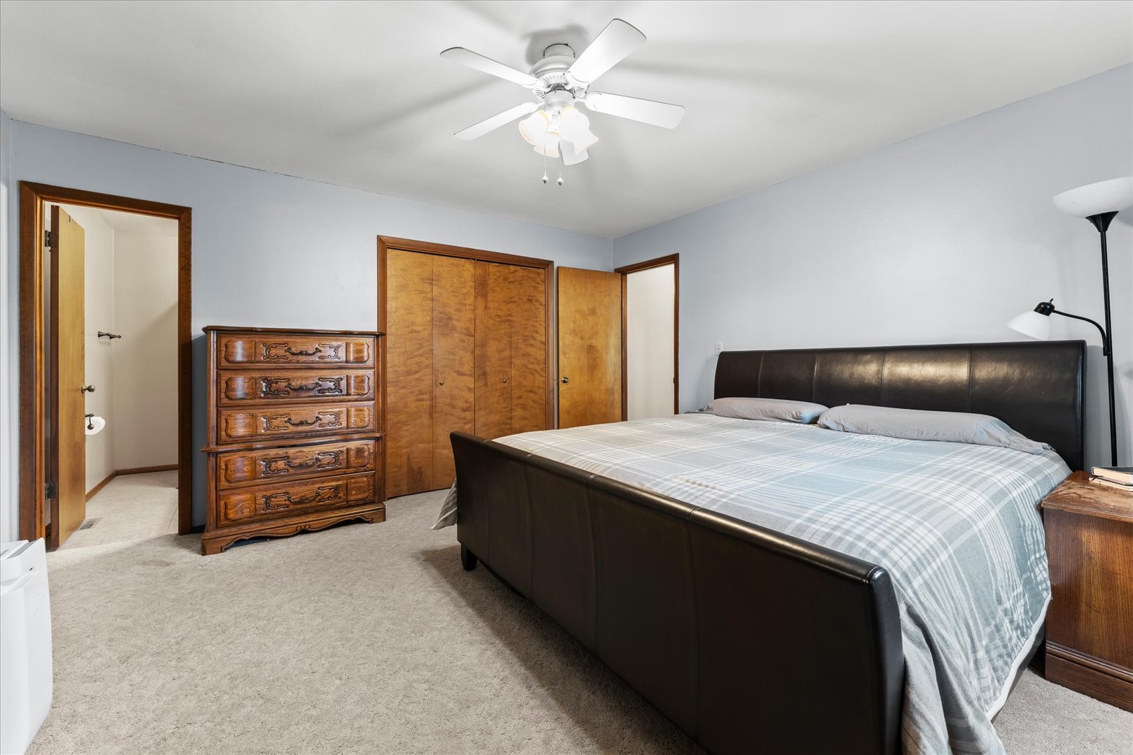 1108 Riverside Court Mahomet, IL 61853 - Photo 24 of 50 a bedroom with a bed and a cabinets