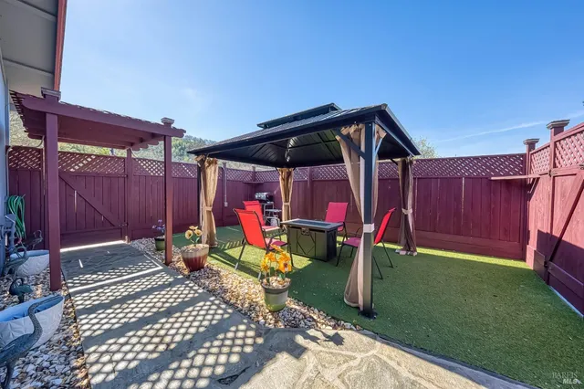 a house view with a backyard space