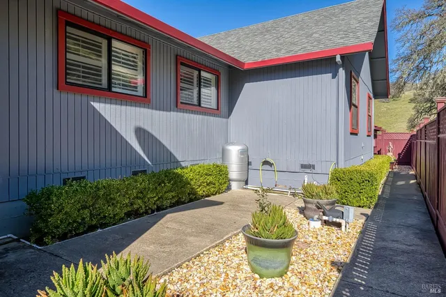 a view of a dining area with furniture window and outside view