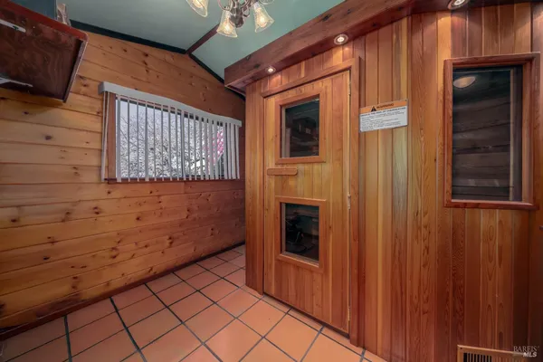 a kitchen with kitchen island a counter top space and a sink