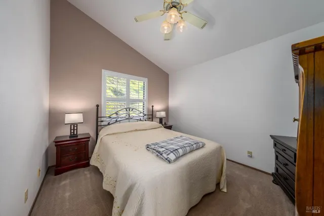 a view of a house with swimming pool and a yard