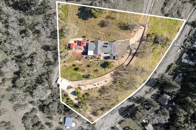 a living room filled with furniture and a table