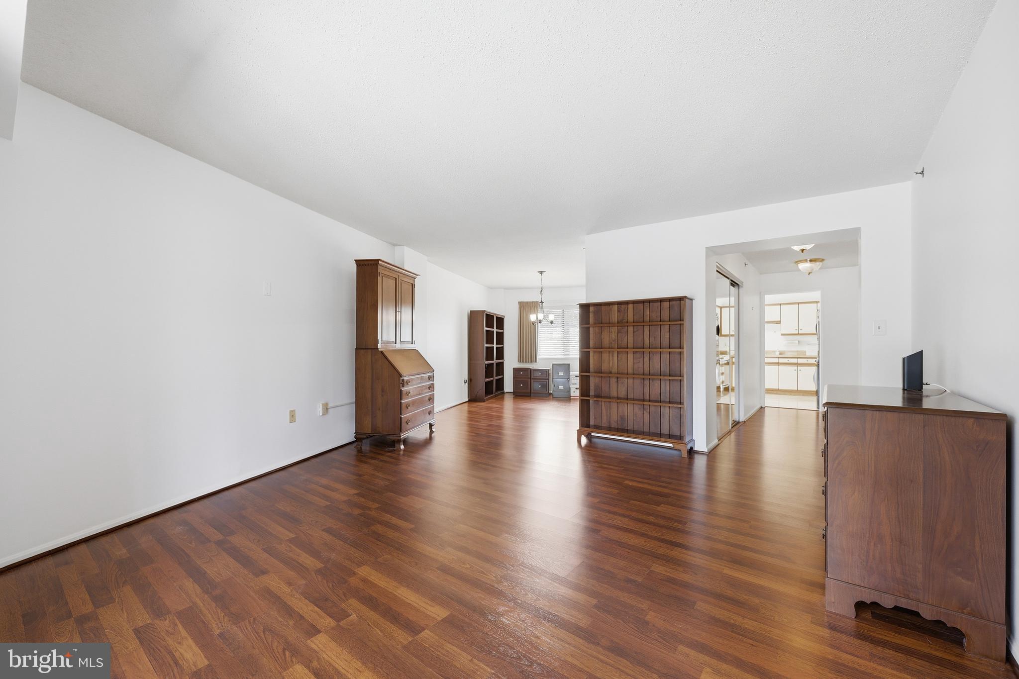 3330 North Leisure World Boulevard, Unit 5109 Silver Spring, MD 20906 - Photo 5 of 44 Living room looking into the Dining Koom & Kitchen