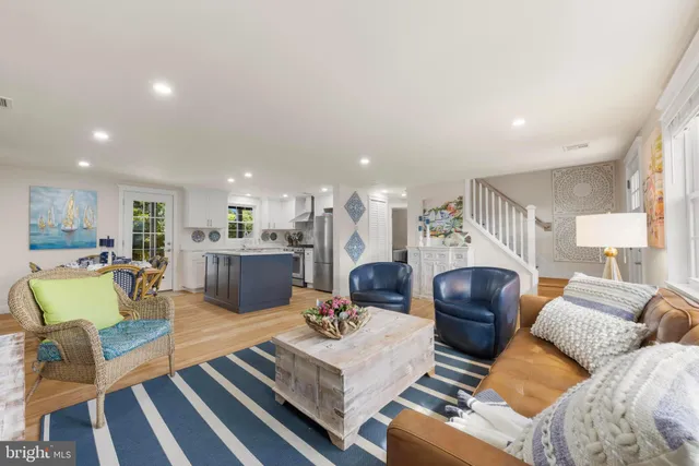 a kitchen with refrigerator and window