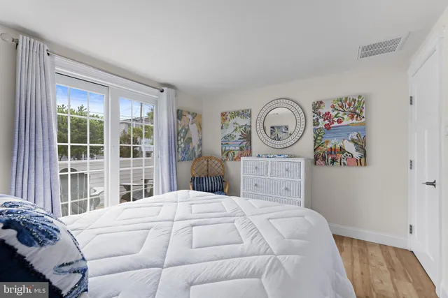 a bedroom with a bed and a closet