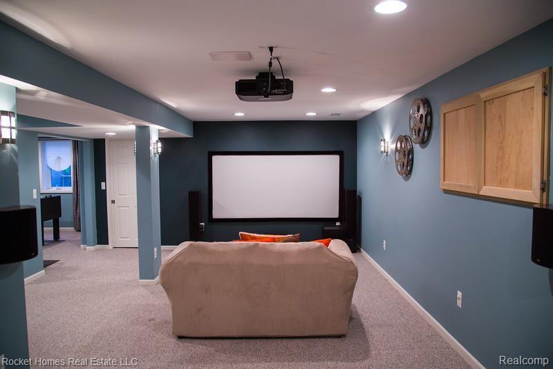 49690 Potomac Road, Unit 73 Canton, MI 48188 - Photo 24 of 29 Finished Basement *excludes projector and speakers