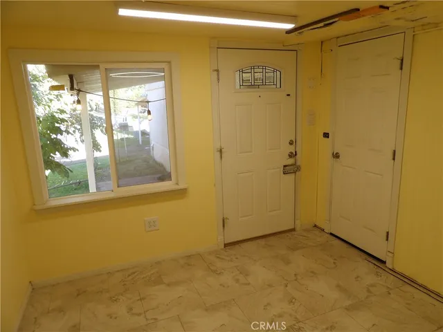 a view of cabinets and window
