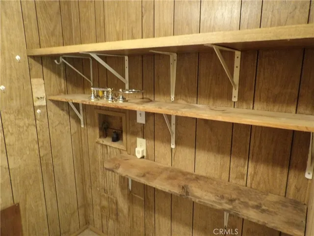 a room with a bed and a window