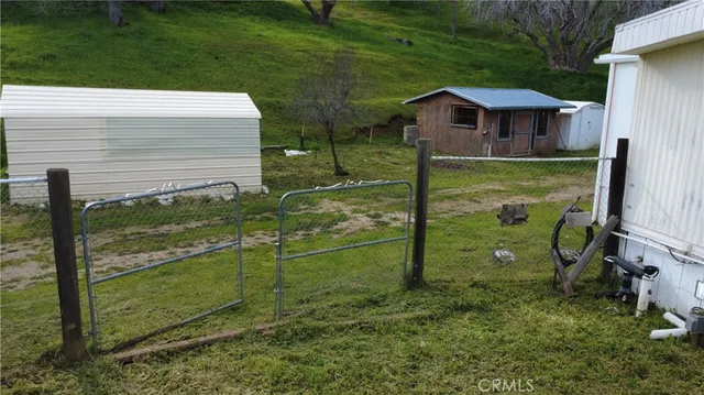 a view of a yard covered in snow