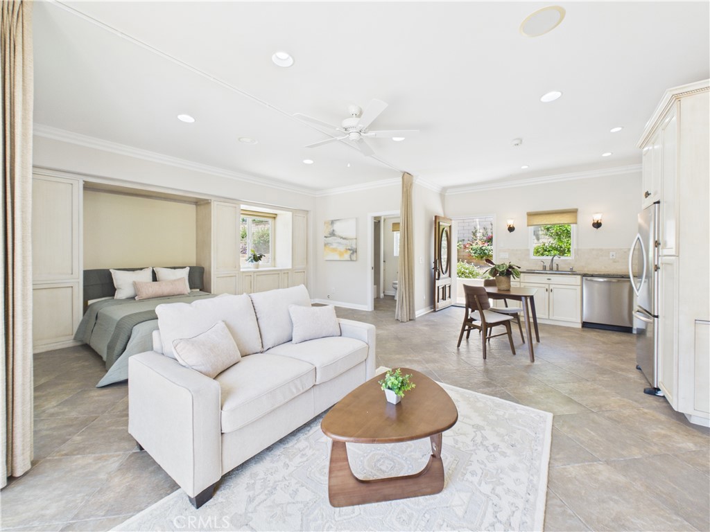 1662 Cherokee Road Corona, CA 92881 - Photo 41 of 60 a living room with furniture and a wooden floor