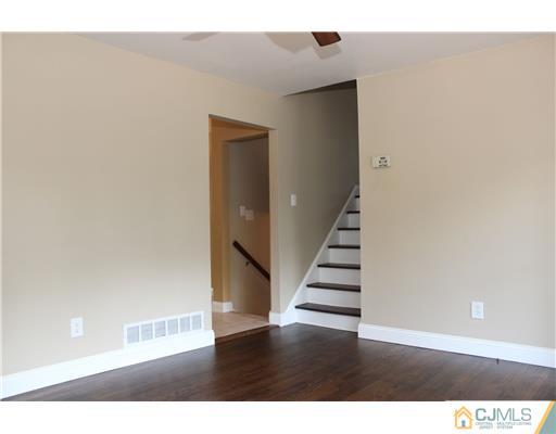 176 Kimberly Road Colonia, NJ 07067 - Photo 4 of 22 a view of entryway with stairs