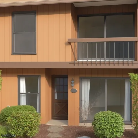 a house view with a garden space