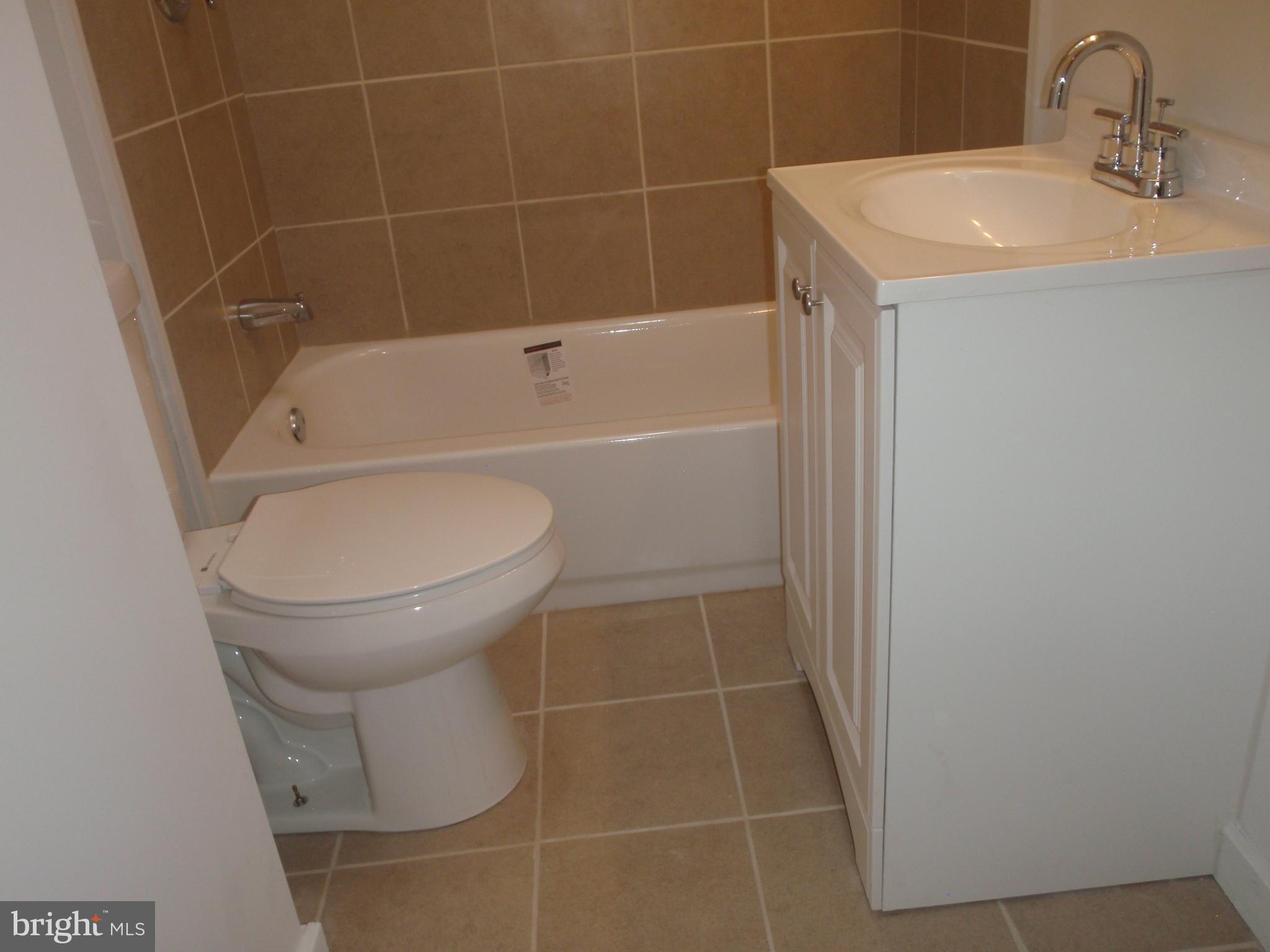 731 Grant Road Folcroft, PA 19032 - Photo 14 of 22 New ceramic tiled bathroom