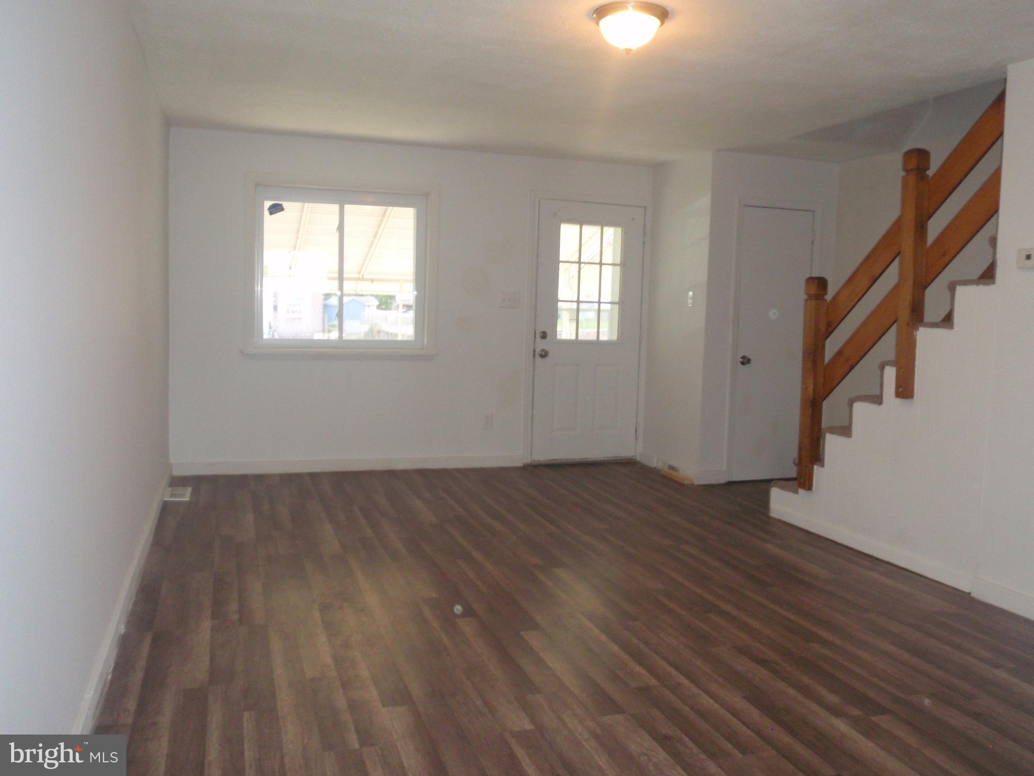 731 Grant Road Folcroft, PA 19032 - Photo 6 of 22 Living room w/new flooring and fresh paint