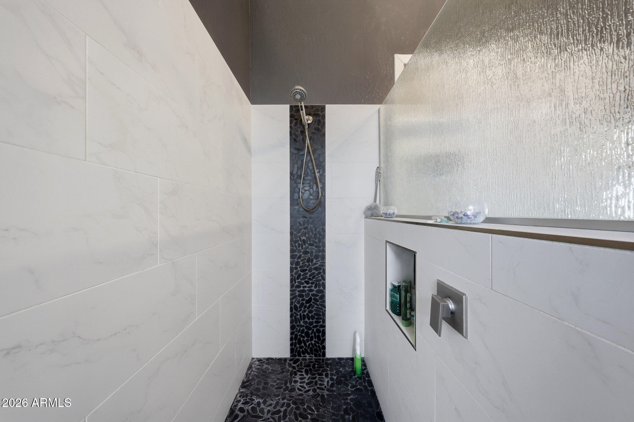 3897 East Cullumber Street Gilbert, AZ 85234 - Photo 24 of 51 a bathroom with a shower and a sink