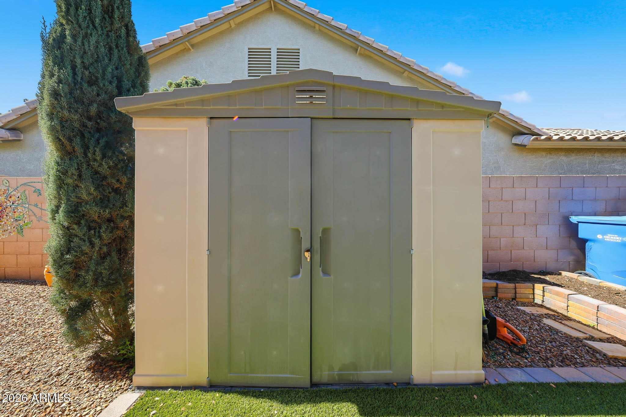 3897 East Cullumber Street Gilbert, AZ 85234 - Photo 42 of 51 a front view of a house with yard