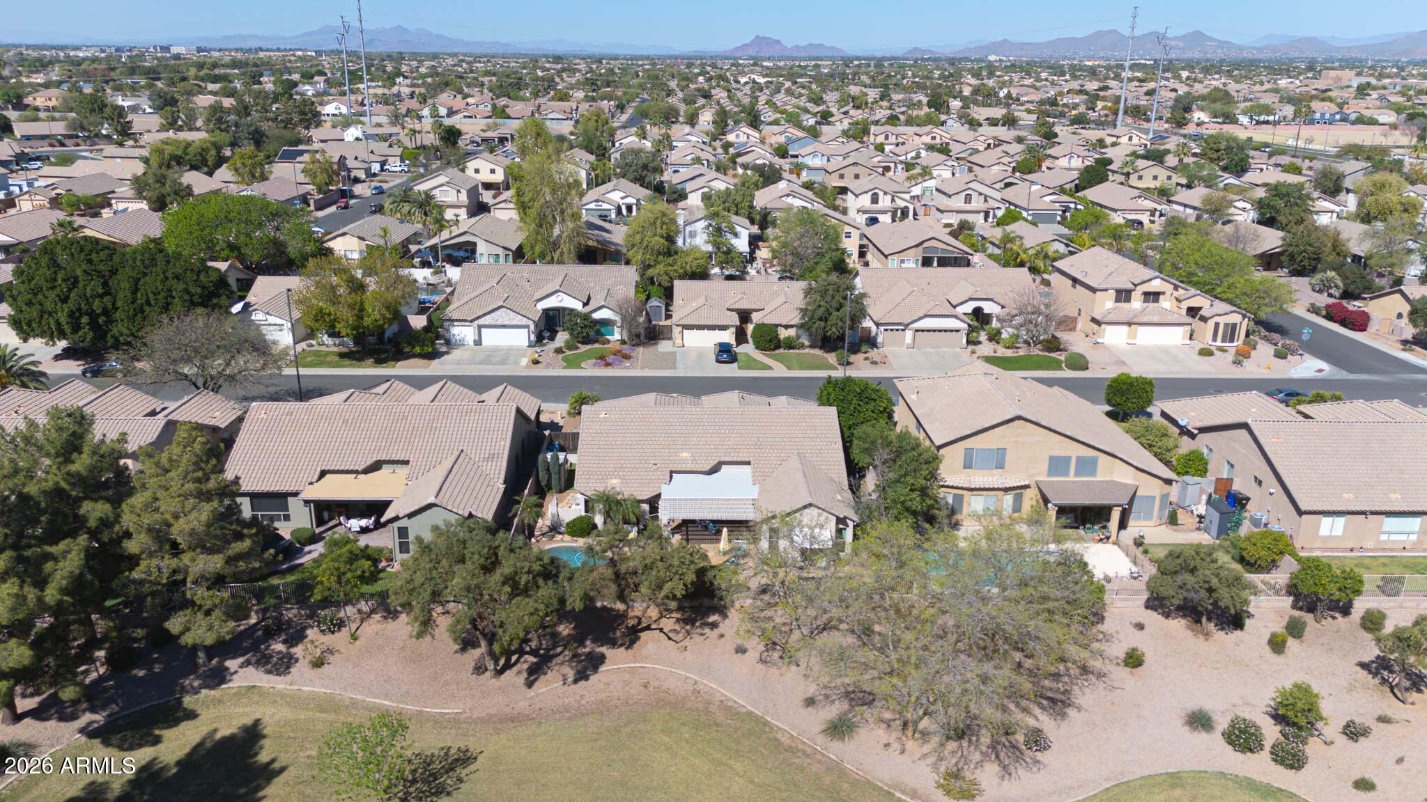 3897 East Cullumber Street Gilbert, AZ 85234 - Photo 48 of 51 an aerial view of a house with a yard