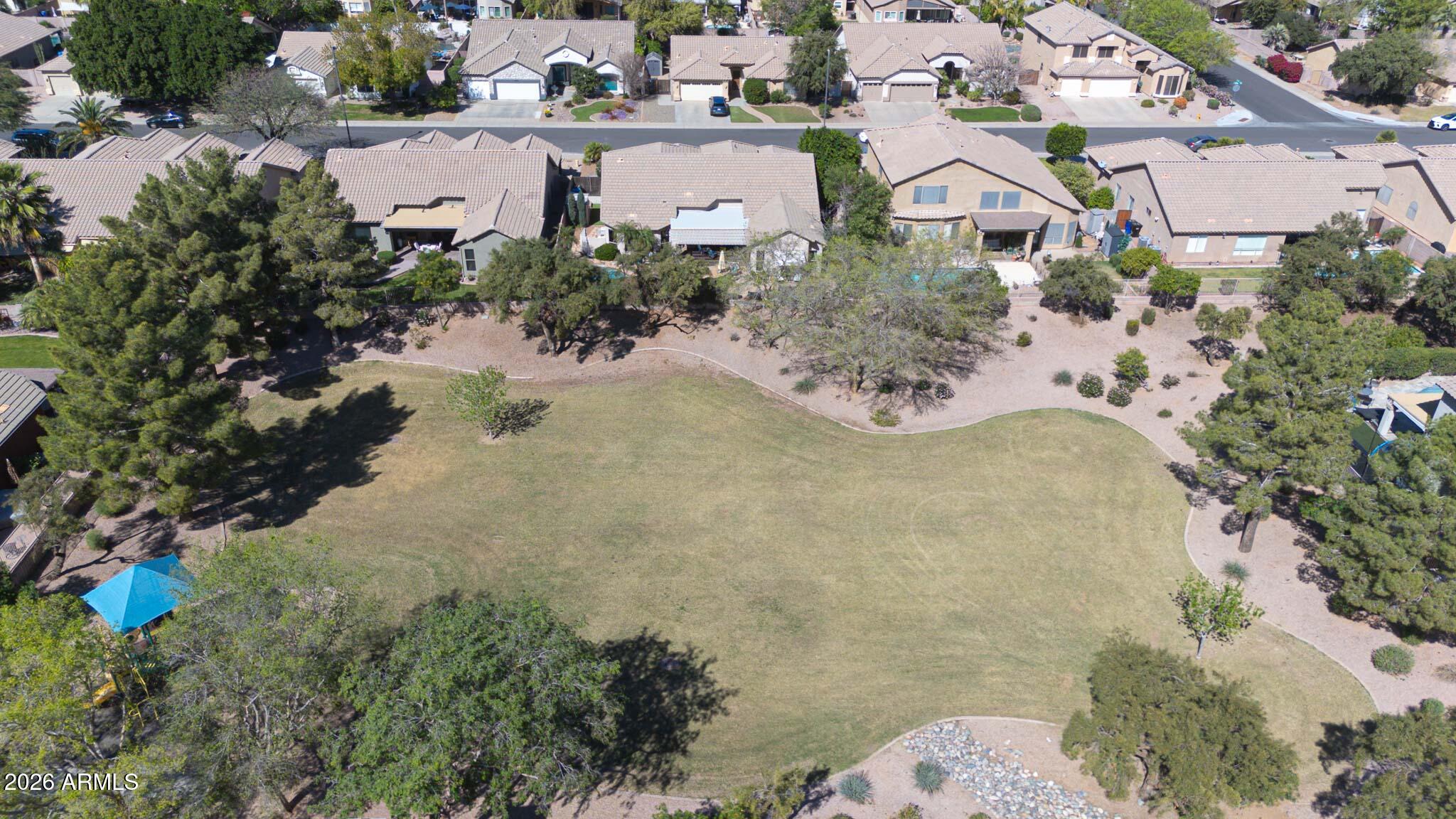 3897 East Cullumber Street Gilbert, AZ 85234 - Photo 49 of 51 an aerial view of a house with a yard