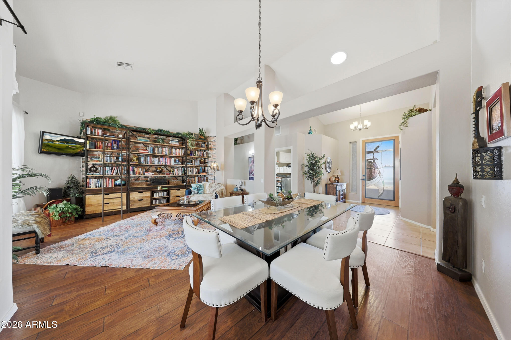 3897 East Cullumber Street Gilbert, AZ 85234 - Photo 5 of 51 a view of a dining room with furniture and wooden floor